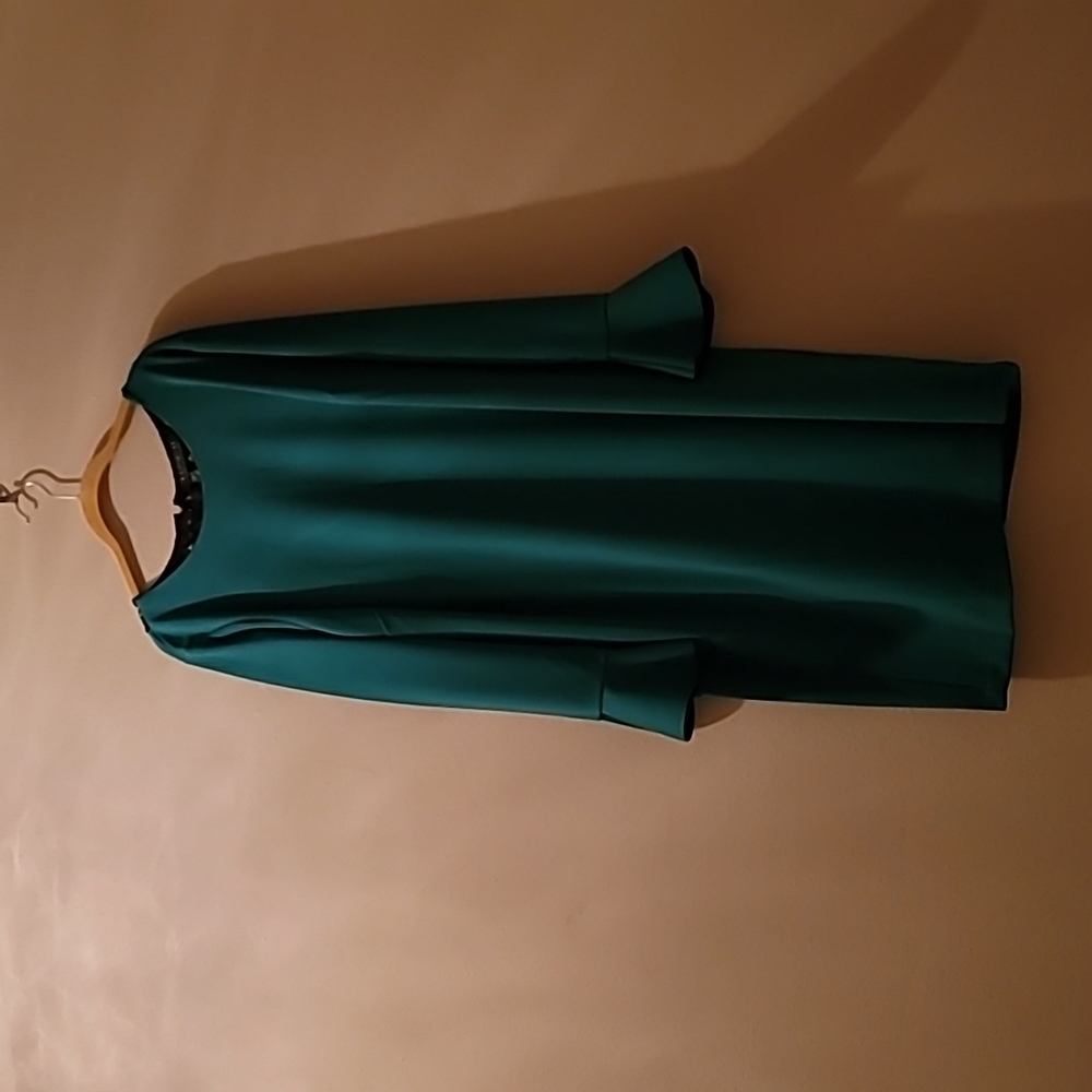 Eloquii ladies dresse size 22 W green it has bell sleeves back  in  back lace.